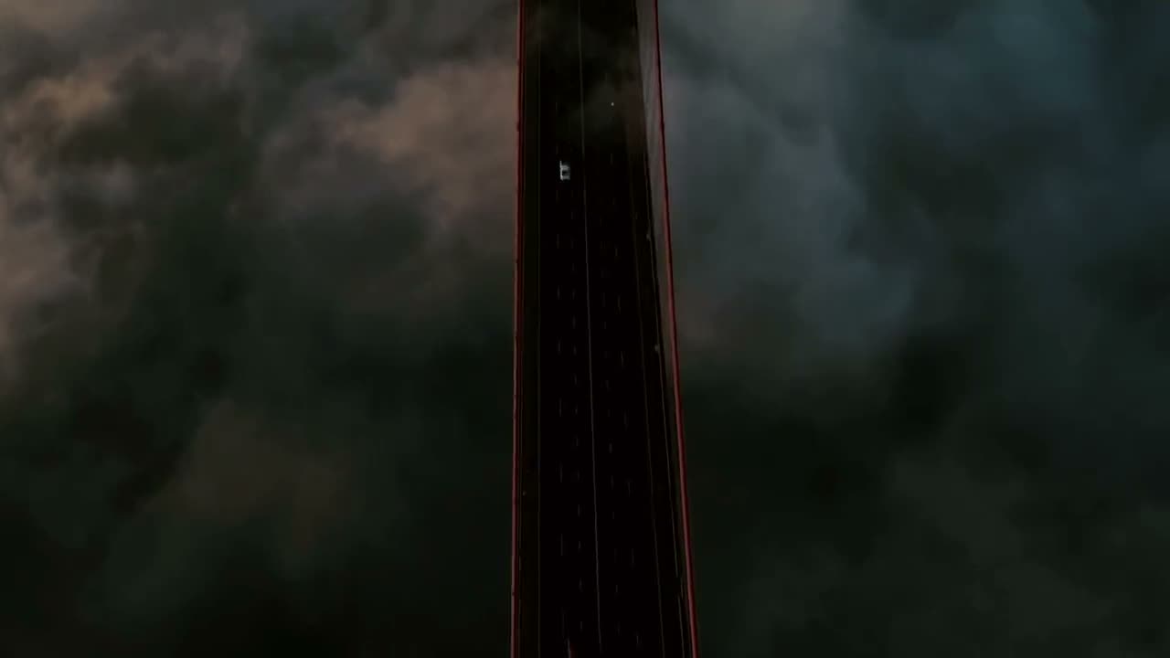 The Golden Gate Bridge rising out of fog