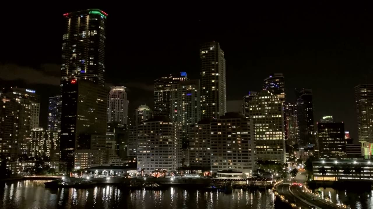Miami skyline at night across the water